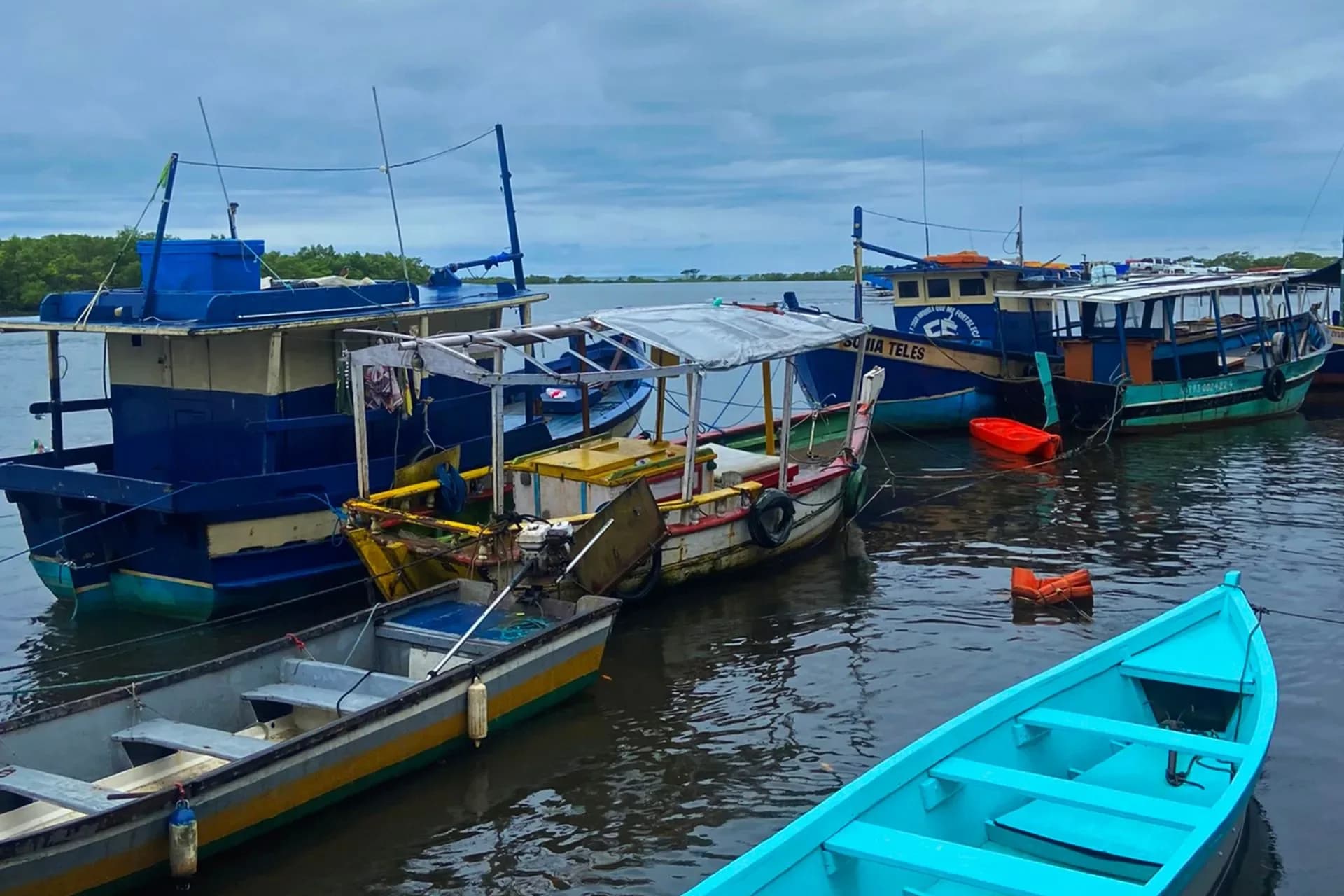 Colorful fishing boats in Santa Cruz Cabrália harbor, Brazil
