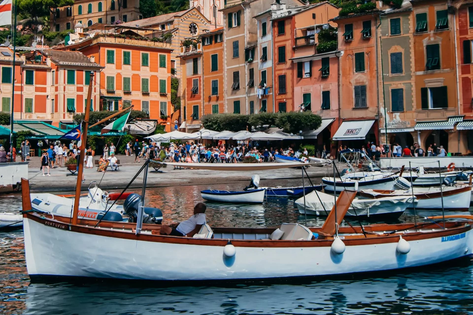 Colorful waterfront buildings and boats in Portofino, Italy