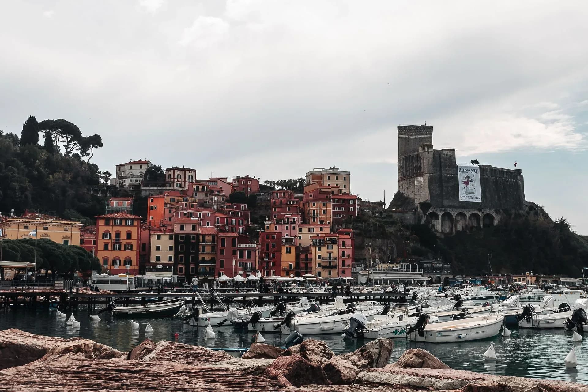 Lerici waterfront town and boats in the harbor, Italy