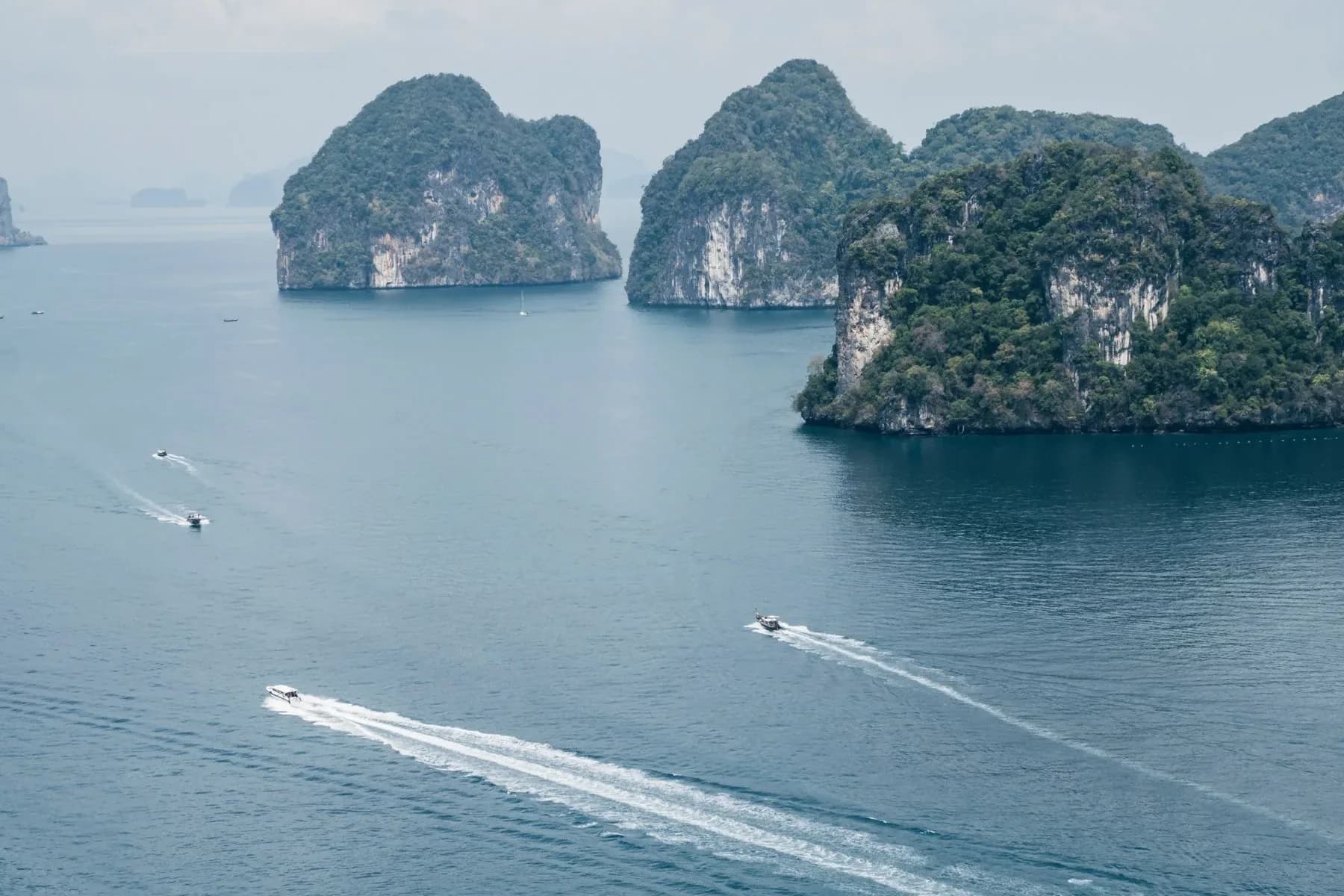 Aerial view of limestone islands and boats in Krabi, Thailand
