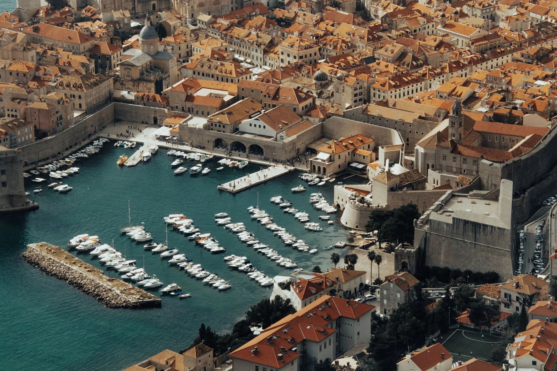 Historic harbor and stone city walls in Dubrovnik, Croatia