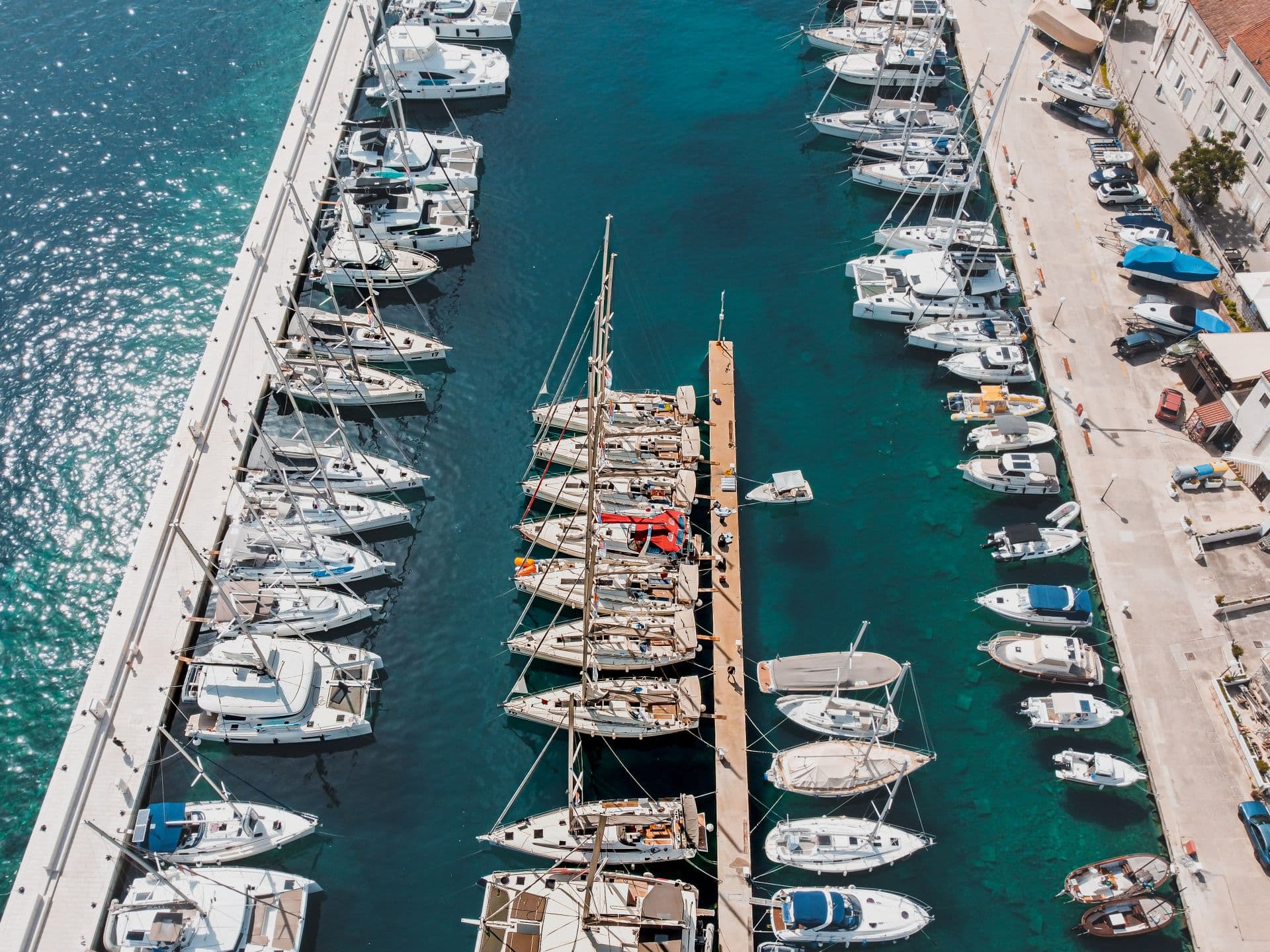 Aerial view of sailboats and yachts moored in a marina